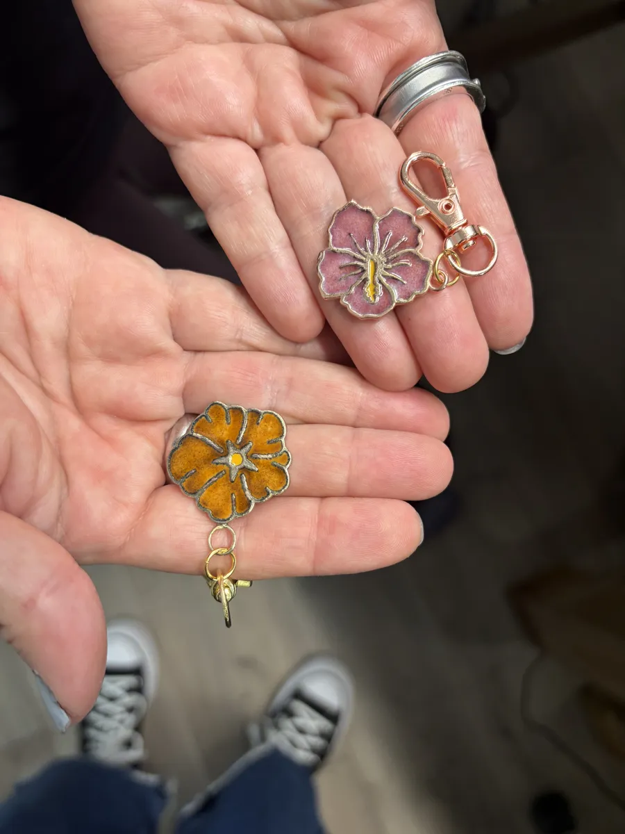 Finished enamel ilima and hibiscus charms