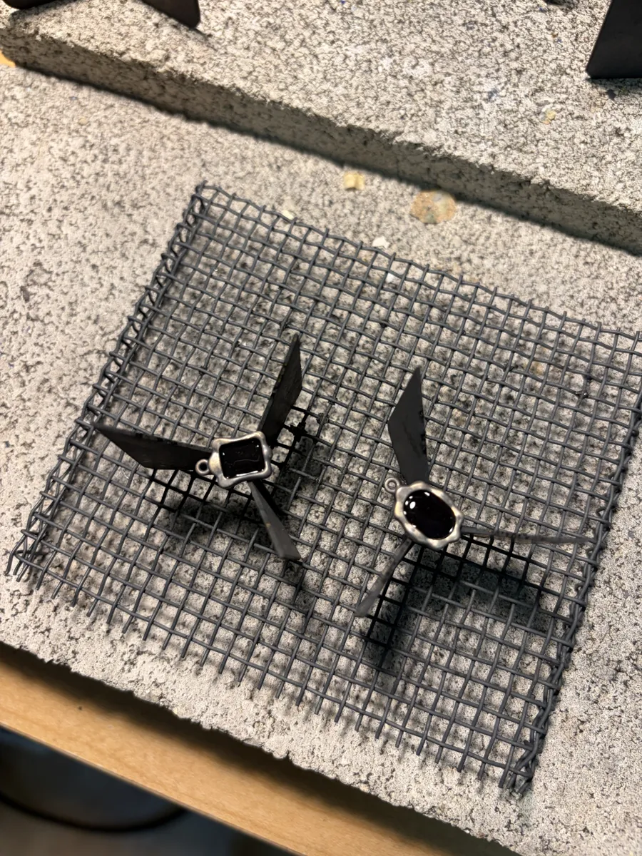 Enameled frames on a firing rack